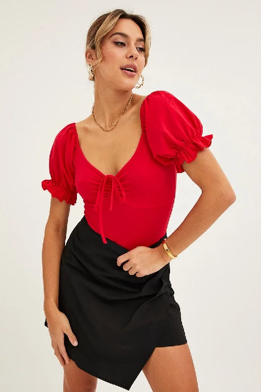Skirts with a tassel trim Black Mini Skirt Wrap Front