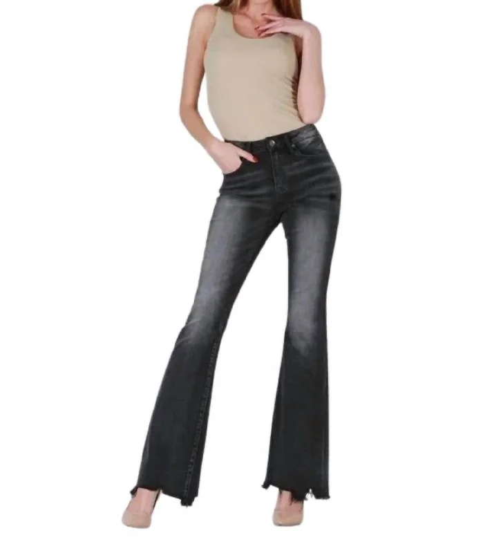 Distressed women jeans for a trendy and edgy lookMid Rise Boot Cut Jeans In Grey